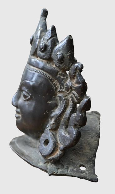 Bronze head of a Buddhist deity, Ming dynasty

Bronze...