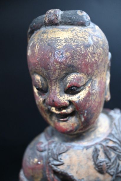 Chinese Sculpture of a Figure Riding a Dragon

A...
