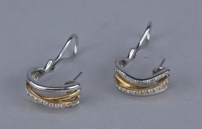 Pair of 18-karat gold earrings with diamonds

Pair...