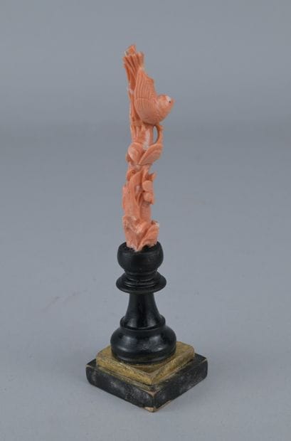Chinese Red Coral Sculpture on a Base

A...