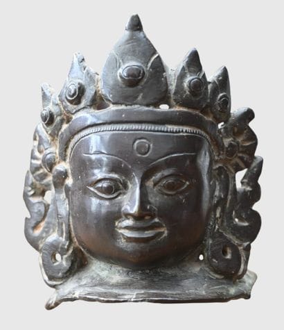 Bronze head of a Buddhist deity, Ming dynasty

Bronze...