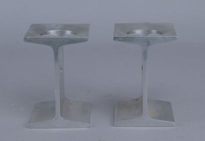 Pair of candleholders by Richard J. Lionetti...