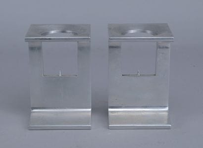 Pair of candleholders by Richard J. Lionetti...