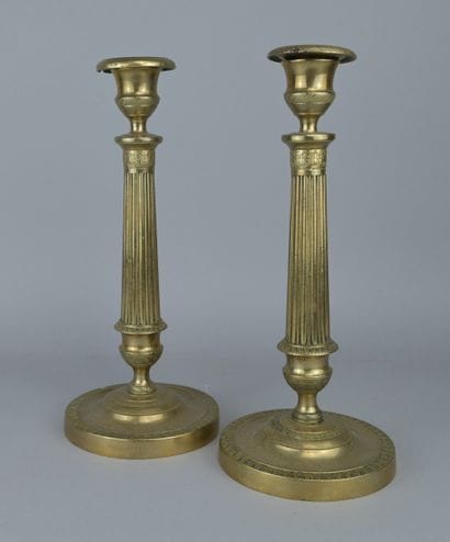 Pair of Empire-style brass candlesticks,...