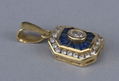 18K Gold Pendant with Sapphires and Diamonds

An...