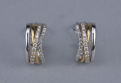 Pair of 18-karat gold earrings with diamonds

Pair...