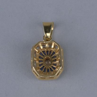 18K Gold Pendant with Sapphires and Diamonds

An...