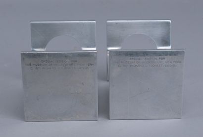 Pair of candleholders by Richard J. Lionetti...