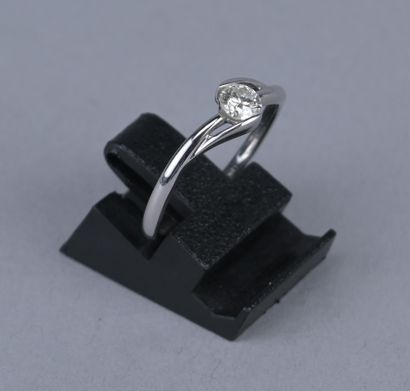 18K white gold solitaire ring with a diamond

18-karat...
