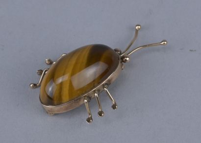 14-karat gold scarab brooch with tiger’s...