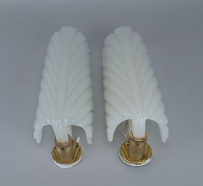 Pair of white Murano glass wall sconces

Pair...
