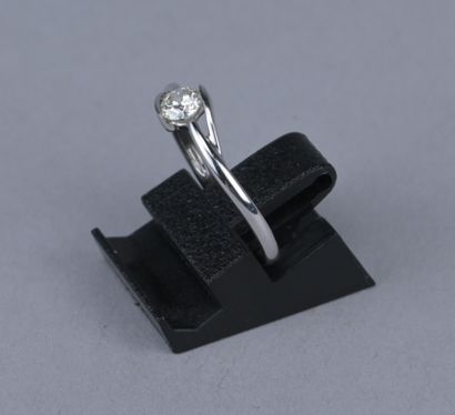 18K white gold solitaire ring with a diamond

18-karat...