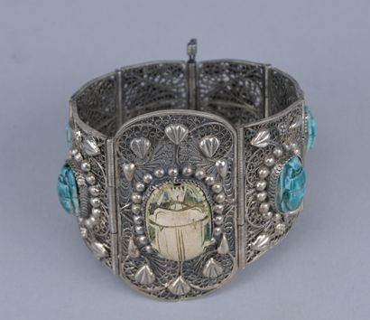 Filigree Silver Bracelet with Scarabs

A...