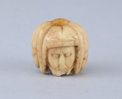Memento Mori Rosary Bead with Four Faces

A...