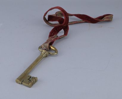 Brass chamberlain’s key with ribbon, 19th...