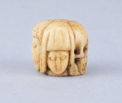 Memento Mori Rosary Bead with Four Faces

A...