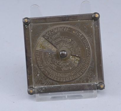 Perpetual calendar in bronze, dated 1720

A...