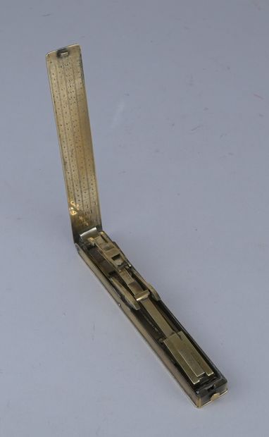 Folding brass coin scale by Butler

Portable...