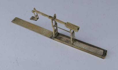 Folding brass coin scale by Butler

Portable...
