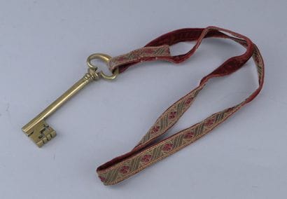 Brass chamberlain’s key with ribbon, 19th...