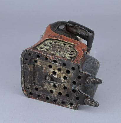 Mechanical piggy bank made of painted cast...