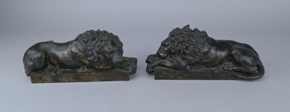 Pair of recumbent cast-iron lions, 19th century

Pair...