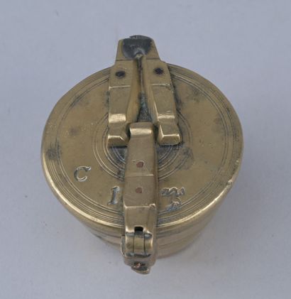 Set of brass cup weights, 18th century

A...