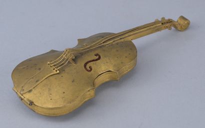 Brass box shaped like a cello, circa 1900

A...