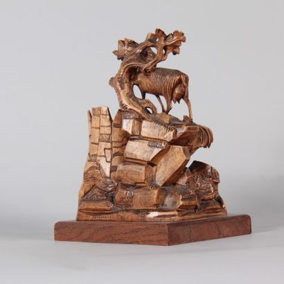 Black Forest – Wooden sculpture depicting...