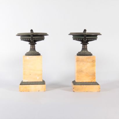 Pair of patinated bronze bowls on Siena marble...