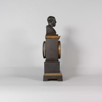 Empire-style clock in patinated and gilded...