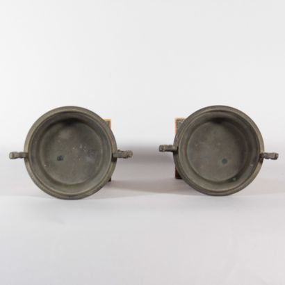 Pair of patinated bronze bowls on Siena marble...