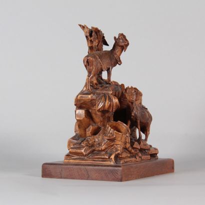 Black Forest – Wooden sculpture depicting...