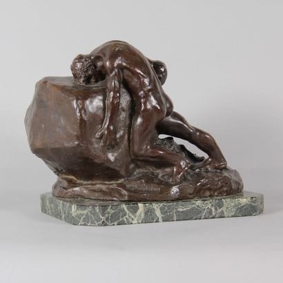 Patinated bronze sculpture depicting two...