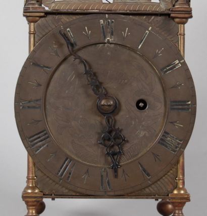 Brass lantern clock with striking mechanism...