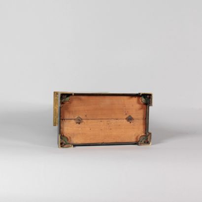 Empire-style clock in patinated and gilded...