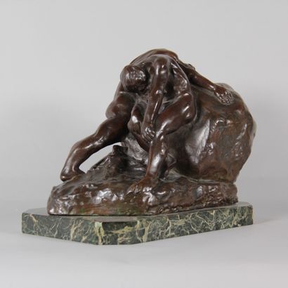 Patinated bronze sculpture depicting two...