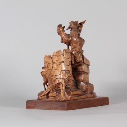 Black Forest – Wooden sculpture depicting...