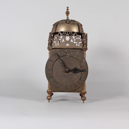 Brass lantern clock with striking mechanism...