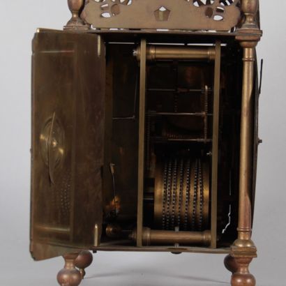 Brass lantern clock with striking mechanism...