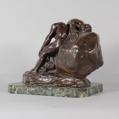 Patinated bronze sculpture depicting two...