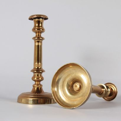Pair of Empire-style brass candlesticks,...