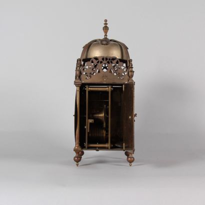 Brass lantern clock with striking mechanism...
