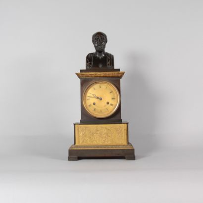 Empire-style clock in patinated and gilded...