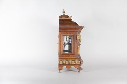 Wooden table clock with gilded bronze trim...