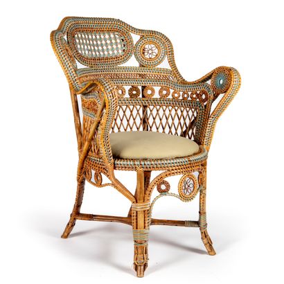 
Large fauteuil en rotin tressé de plusieurs...