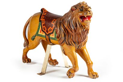 Carved polychrome wood lion forming a carousel...
