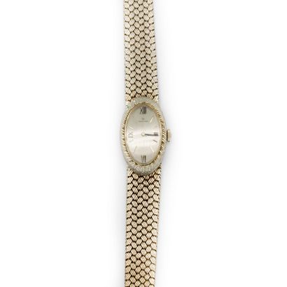 MOVADO
Montre de dame en or gris (750), boîtier...