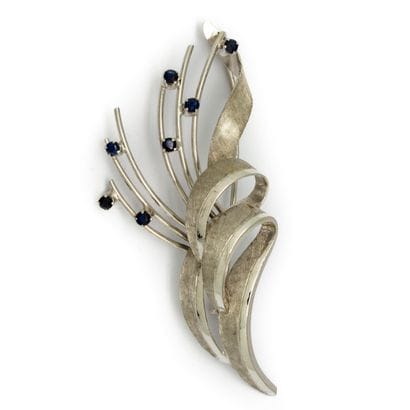 Broche en forme de gerbe en or gris brillant...