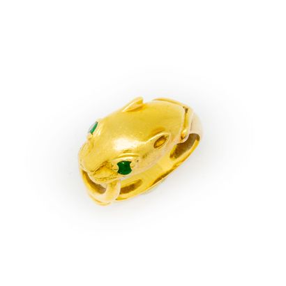 Bague en or jaune (750e) en forme de tête...